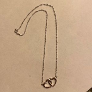 Entwined heart necklace. Appears to be stamped 925 on the back of the hearts.